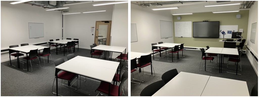 Classroom with groups of tables and chairs.
